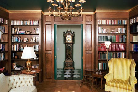 Custom Solid Mahogany English Library by Artisans of the Valley - Shown with Pocket Doors open view into hallway with grandfather clock.