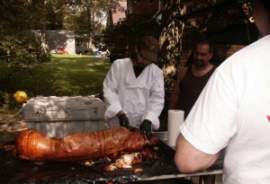 Eric Saperstein Artisans of the Valley & Bill Corbo at the first use of custom chef's (butcher) knife "Artemis" by Jay Fisher at Pig Roast