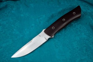 Fighter: O1 tool steel, stainless steel pins, paper micarta handle, Blade length 4 ¾” Overall length 10” by Stacy J. Nabinger Price $300