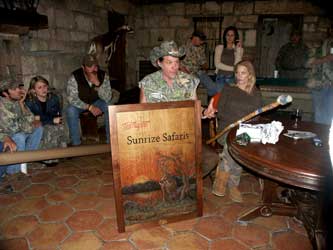 Presentation of a Whitetail Deer Relief Carving entitled "Whitetail Sunrize" by Eric M. Saperstein and a custom personalized walking sticked (Staff) by Stanley Saperstein of Artisans of the Valley December 13, 2006 to Ted & Shemane Nugent at the YO Ranch in Mountain Home, TX
