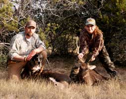 2006 YO Ranch Hunting Trip - Guide Brian, Tracking Dog "Head", and Theresa Tonte with her first buck - an 8pt Sika