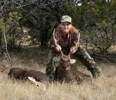 Theresa Tonte - YO Ranch 2006 with Doe & 8pt Sika Buck