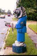 Artisans of the Valley feature Chainsaw Carving by Bob Eigenrauch - Tiger in Bathrobe Mailbox Profile