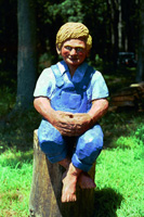 Artisans of the Valley feature Chainsaw Carving by Bob Eigenrauch - Fishing Boy sitting on Stump