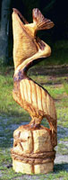 Artisans of the Valley feature Chainsaw Carving by Bob Eigenrauch - Pelican Swallowing a Fish
