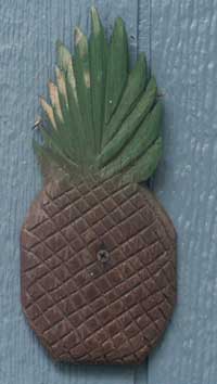 Hand carved pineapple applique